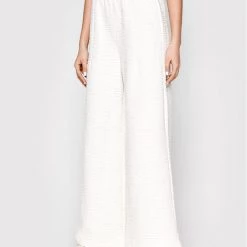 Puma Γυναίκες Υφασμάτινα Παντελόνια Πλεκτό παντελόνι Snow Tiger 533476 Μπεζ Relaxed Fit Μπεζ